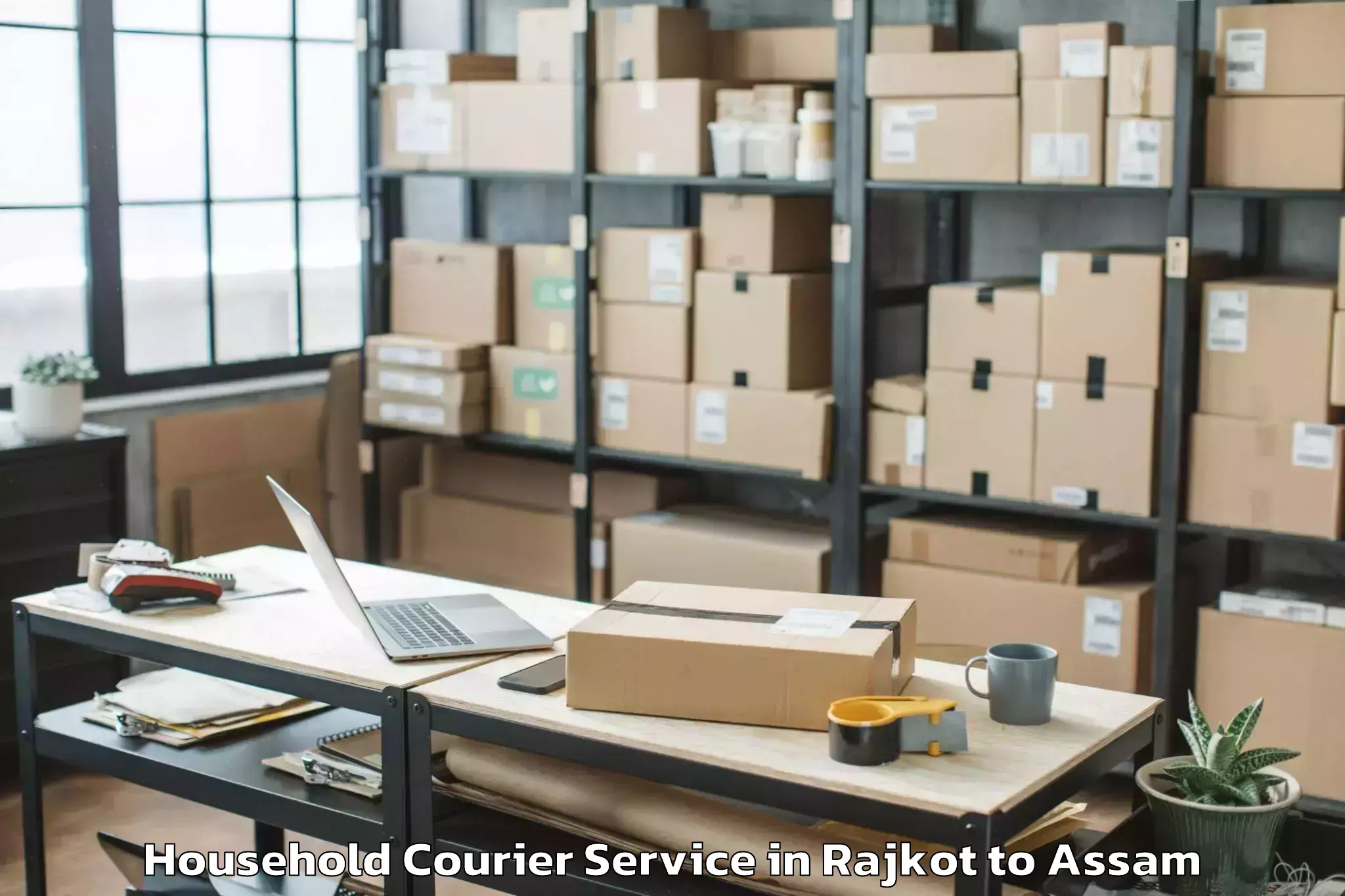 Book Rajkot to Biswanath Charali Household Courier Online